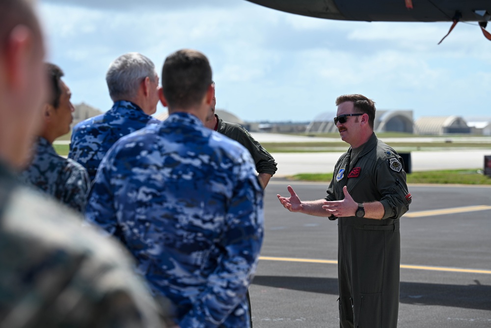 Distinguished visitors from Cope North 2025 visit 34th EBS B-1B Lancer during immersion tour