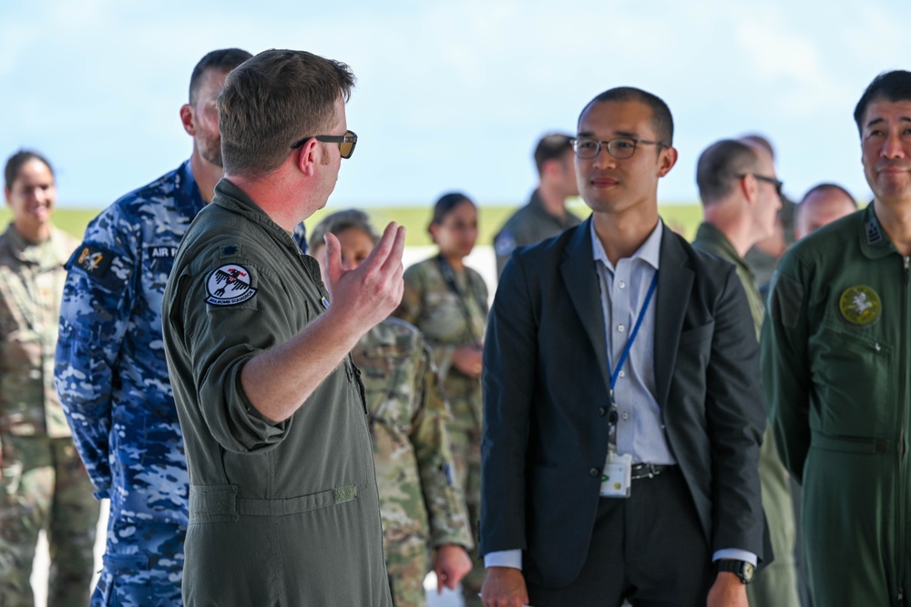 Distinguished visitors from Cope North 2025 visit 34th EBS B-1B Lancer during immersion tour