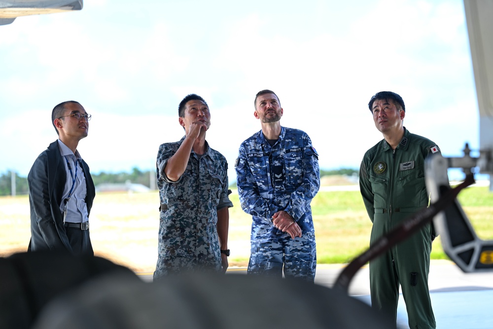 Distinguished visitors from Cope North 2025 visit 34th EBS B-1B Lancer during immersion tour