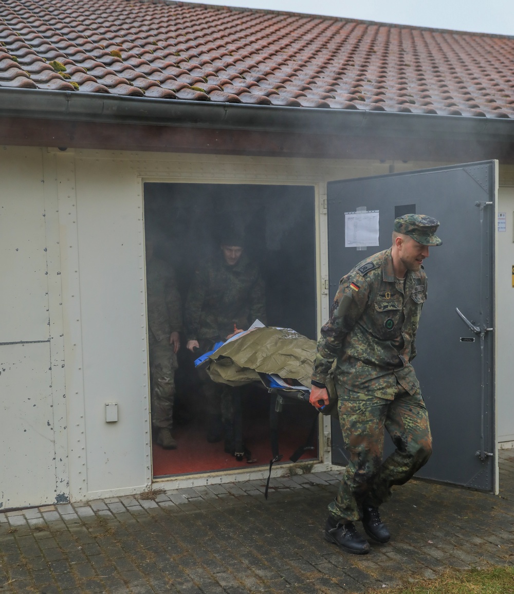 U.S. Army CATC and German Bundeswehr Medical Academy soldiers conduct trauma lane simulation exercise