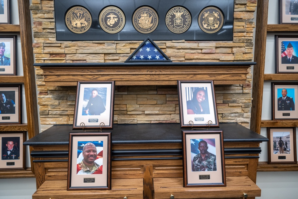 Honoring sacrifice: Hall of Heroes photo mounting ceremony pays tribute to families of fallen Soldiers.