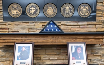 Honoring sacrifice: Hall of Heroes photo mounting ceremony pays tribute to families of fallen Soldiers.