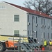 Contractors prepare second World War II-era barracks to be moved at Fort McCoy