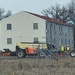 Contractors prepare second World War II-era barracks to be moved at Fort McCoy