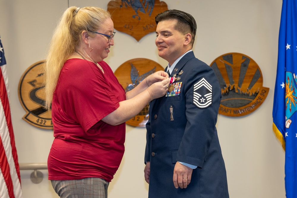 Chief Master Sgt. Arenibar Retires from Active Duty Service