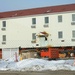 Contractors prepare second World War II-era barracks to be moved at Fort McCoy