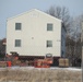 Contractors prepare second World War II-era barracks to be moved at Fort McCoy