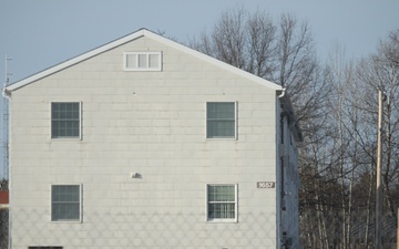 Contractors prepare second World War II-era barracks to be moved at Fort McCoy