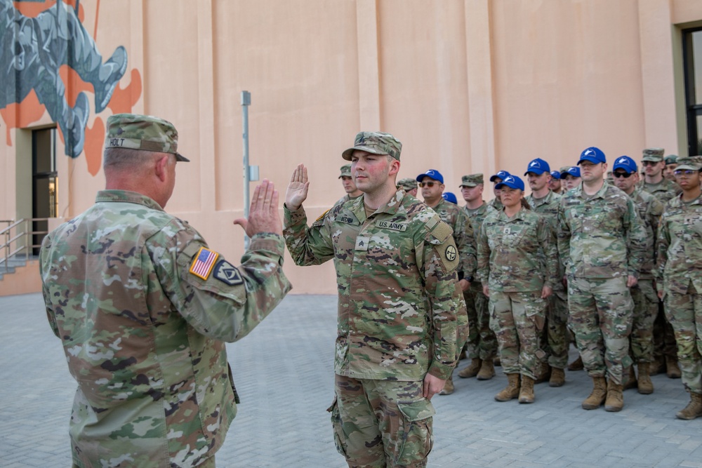 U.S. Army Sgt. Joshua Becher, West Virginia Army National Guard reenlists at the Qatar National Service Academy in Umm Salal Muhammed, Qatar Feb. 5, 2025.