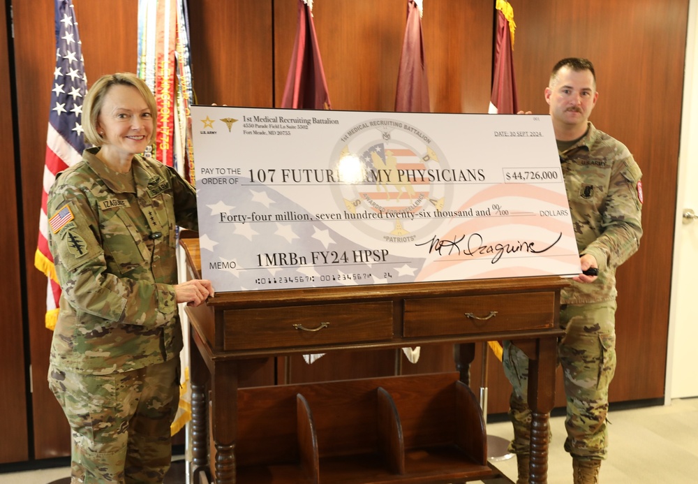 Army Surgeon General thanks 1st Medical Recruiting Battalion with “Big Check” for generating 107 HPSP scholarships