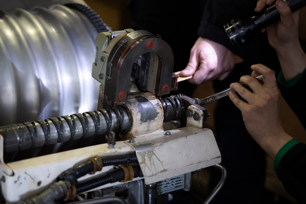 Nimitz Sailors Conduct Maintenance on Aircraft