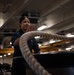 Nimitz Sailor Wraps a Line Around the Capstan