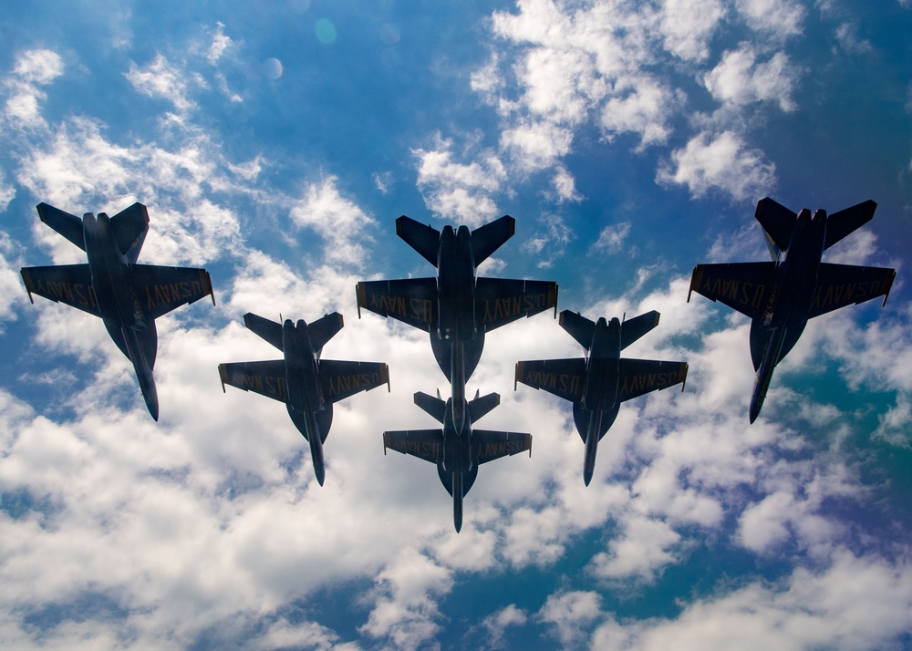 The Navy Flight Demonstration Squadron, the Blue Angels, perform in Pensacola Beach, FL.