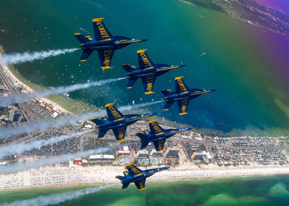 The Navy Flight Demonstration Squadron, the Blue Angels, perform in Pensacola Beach, FL.