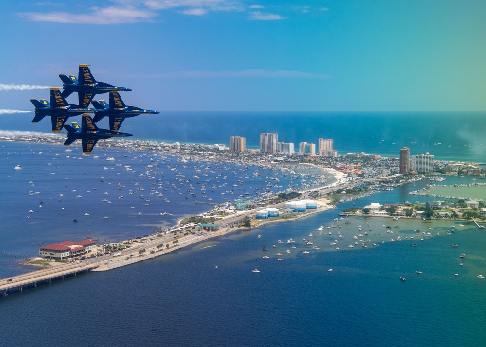 The Navy Flight Demonstration Squadron, the Blue Angels, perform in Pensacola Beach, FL.