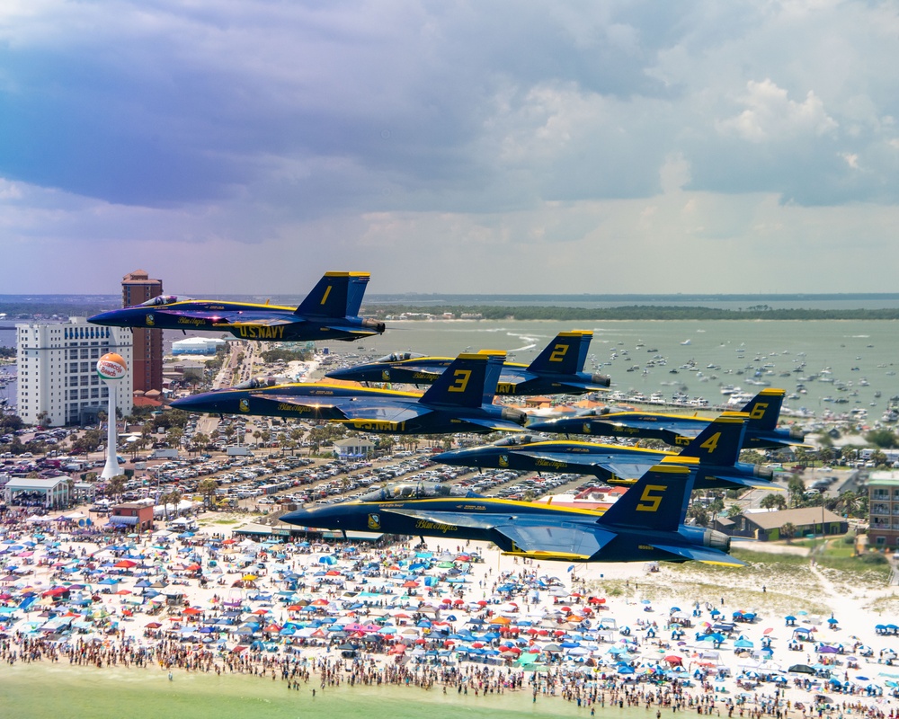 The Navy Flight Demonstration Squadron, the Blue Angels, perform in Pensacola Beach, FL.