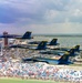 The Navy Flight Demonstration Squadron, the Blue Angels, perform in Pensacola Beach, FL.