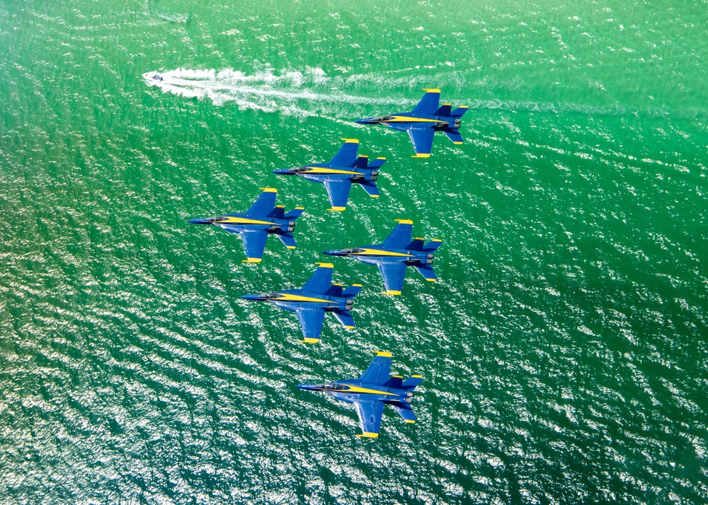 The Navy Flight Demonstration Squadron, the Blue Angels, perform in Pensacola Beach, FL.