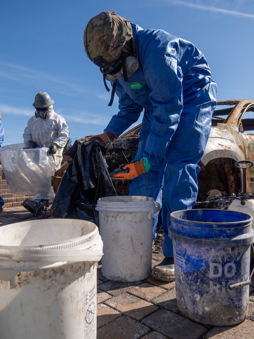 Soldiers clear wildfire hazardous waste from homes in California