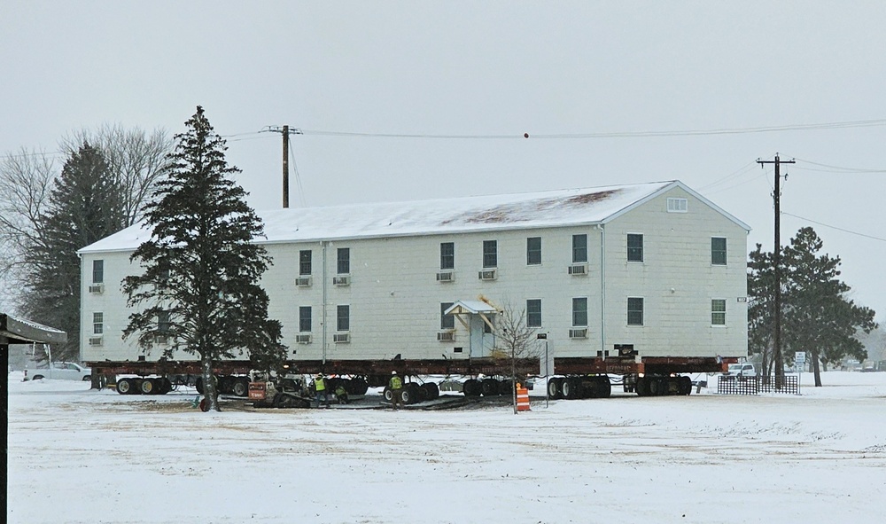 Workers successfully move second World War II barracks at Fort McCoy; preparations under way to move third building