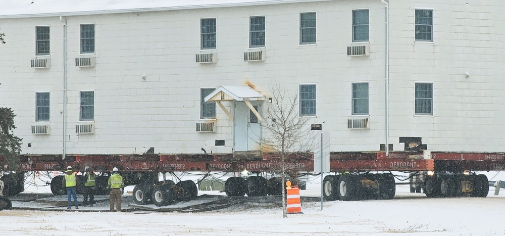 Workers successfully move second World War II barracks at Fort McCoy; preparations under way to move third building