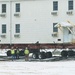 Workers successfully move second World War II barracks at Fort McCoy; preparations under way to move third building