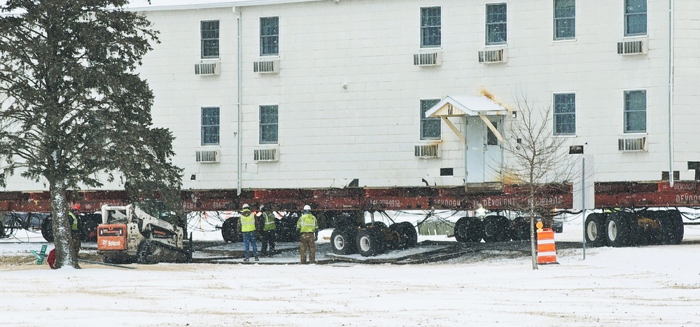 Workers successfully move second World War II barracks at Fort McCoy; preparations under way to move third building