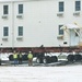 Workers successfully move second World War II barracks at Fort McCoy; preparations under way to move third building