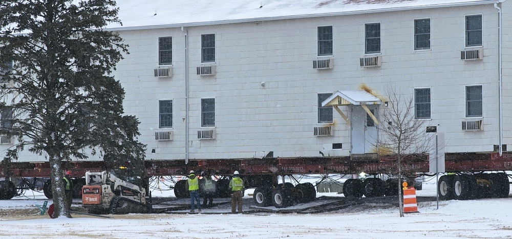 Workers successfully move second World War II barracks at Fort McCoy; preparations under way to move third building