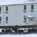 Workers successfully move second World War II barracks at Fort McCoy; preparations under way to move third building