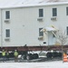 Workers successfully move second World War II barracks at Fort McCoy; preparations under way to move third building