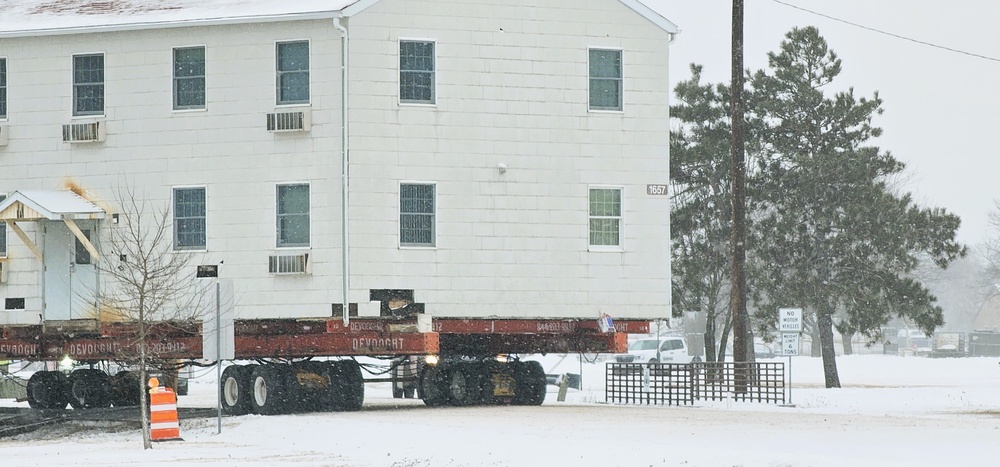 Workers successfully move second World War II barracks at Fort McCoy; preparations under way to move third building