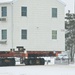 Workers successfully move second World War II barracks at Fort McCoy; preparations under way to move third building