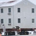 Workers successfully move second World War II barracks at Fort McCoy; preparations under way to move third building