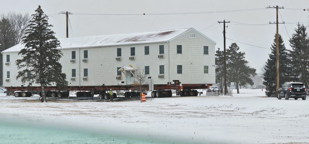 Workers successfully move second World War II barracks at Fort McCoy; preparations under way to move third building