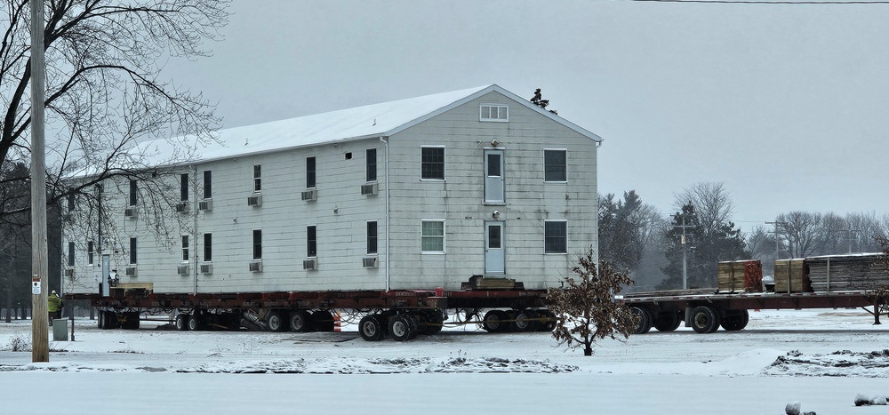 Workers successfully move second World War II barracks at Fort McCoy; preparations under way to move third building