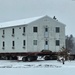 Workers successfully move second World War II barracks at Fort McCoy; preparations under way to move third building