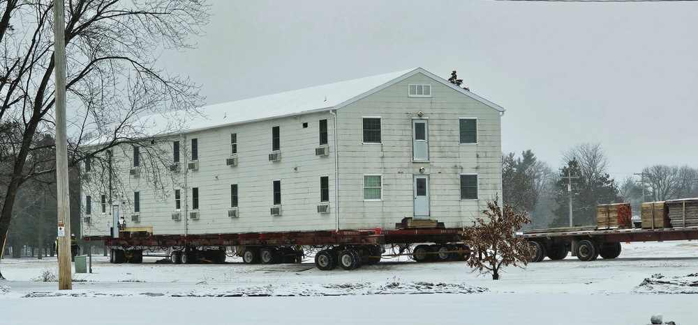 Workers successfully move second World War II barracks at Fort McCoy; preparations under way to move third building