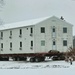 Workers successfully move second World War II barracks at Fort McCoy; preparations under way to move third building