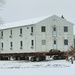 Workers successfully move second World War II barracks at Fort McCoy; preparations under way to move third building