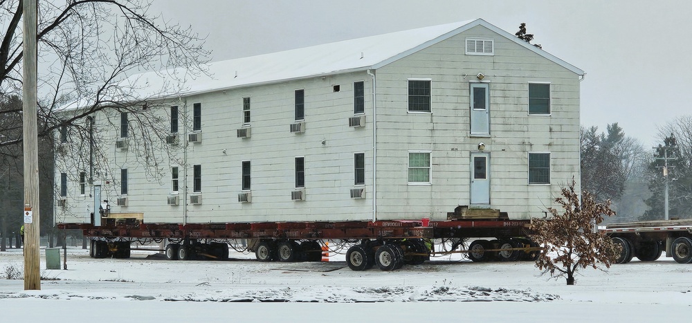 Workers successfully move second World War II barracks at Fort McCoy; preparations under way to move third building