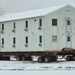 Workers successfully move second World War II barracks at Fort McCoy; preparations under way to move third building