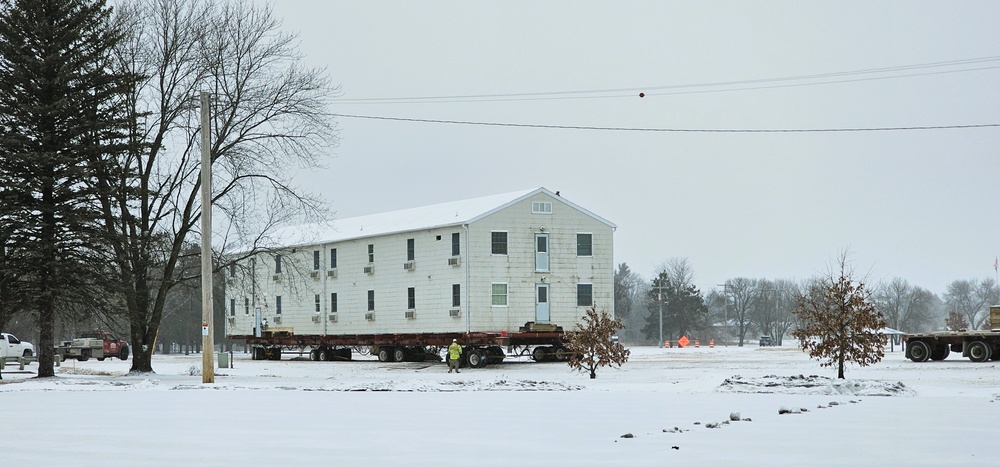 Workers successfully move second World War II barracks at Fort McCoy; preparations under way to move third building