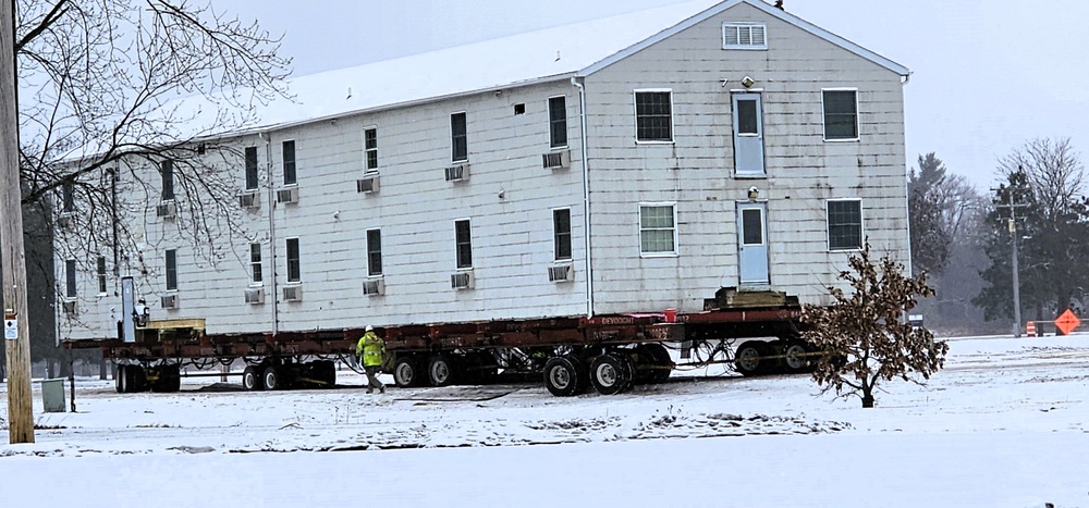 Workers successfully move second World War II barracks at Fort McCoy; preparations under way to move third building