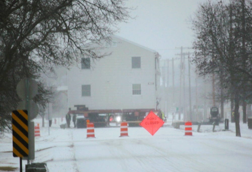 Workers successfully move second World War II barracks at Fort McCoy; preparations under way to move third building