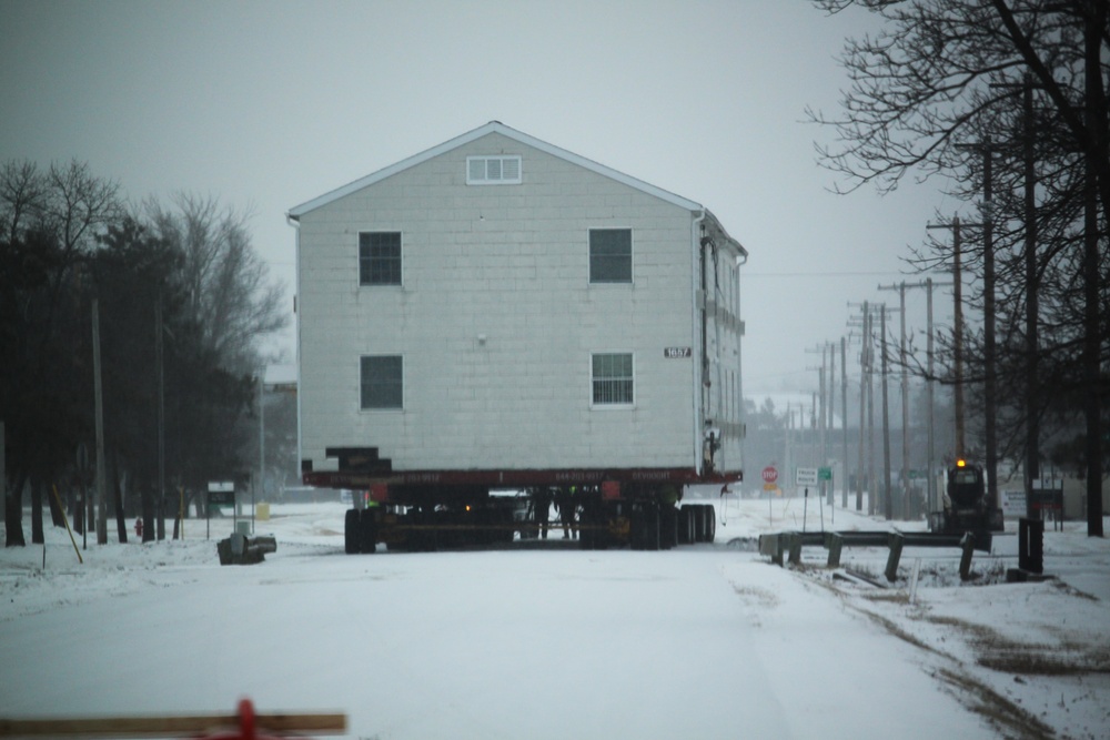 Workers successfully move second World War II barracks at Fort McCoy; preparations under way to move third building