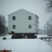 Workers successfully move second World War II barracks at Fort McCoy; preparations under way to move third building