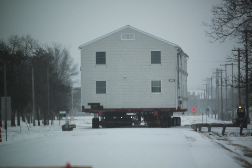 Workers successfully move second World War II barracks at Fort McCoy; preparations under way to move third building