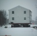 Workers successfully move second World War II barracks at Fort McCoy; preparations under way to move third building