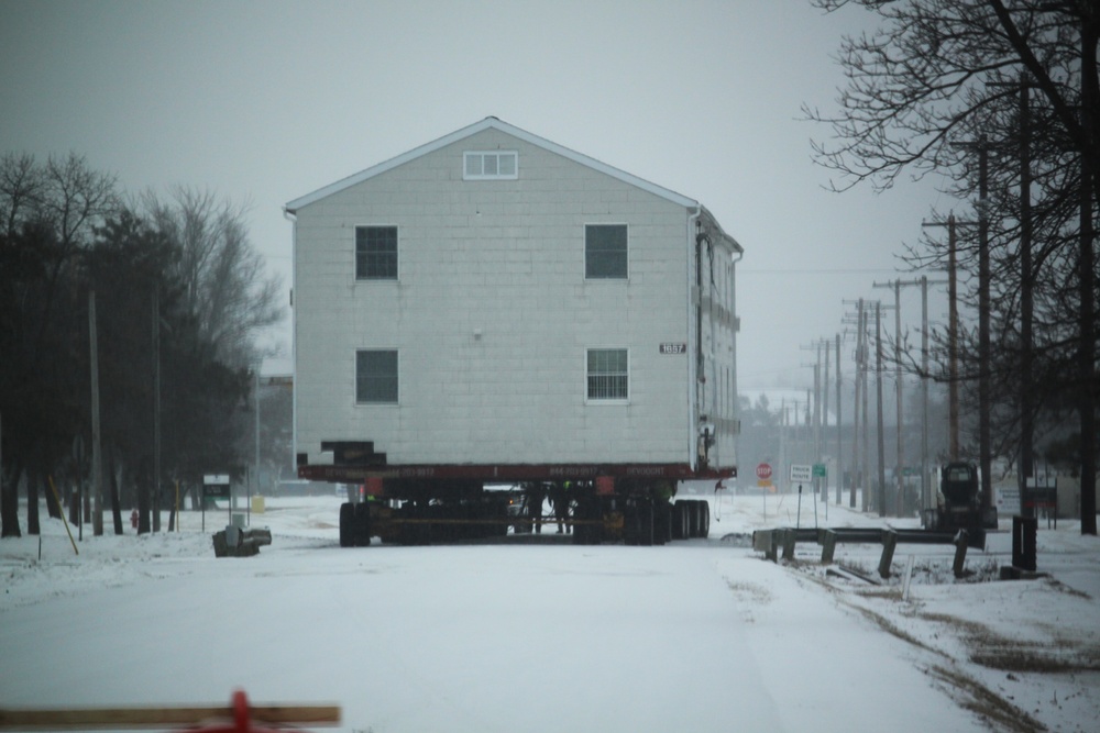 Workers successfully move second World War II barracks at Fort McCoy; preparations under way to move third building